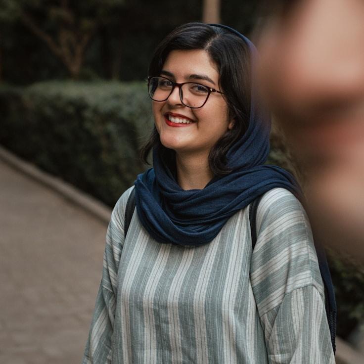 A Client Relations Director discussing corporate gifting strategy with business clients